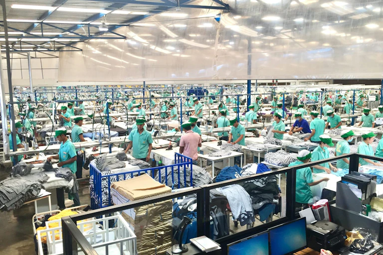Workers on a factory floor.