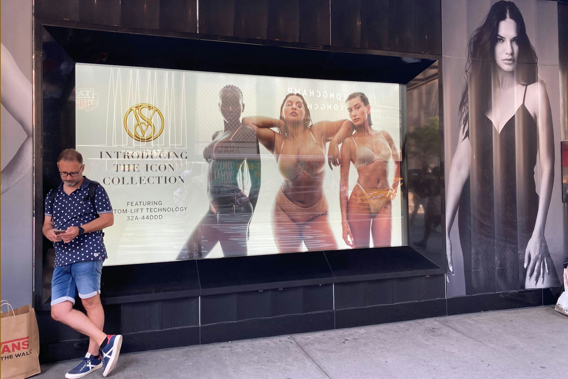 A large poster in a shop window showing women in underwear