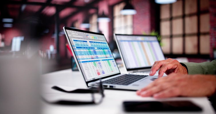 Spreadsheet data on a laptop screen