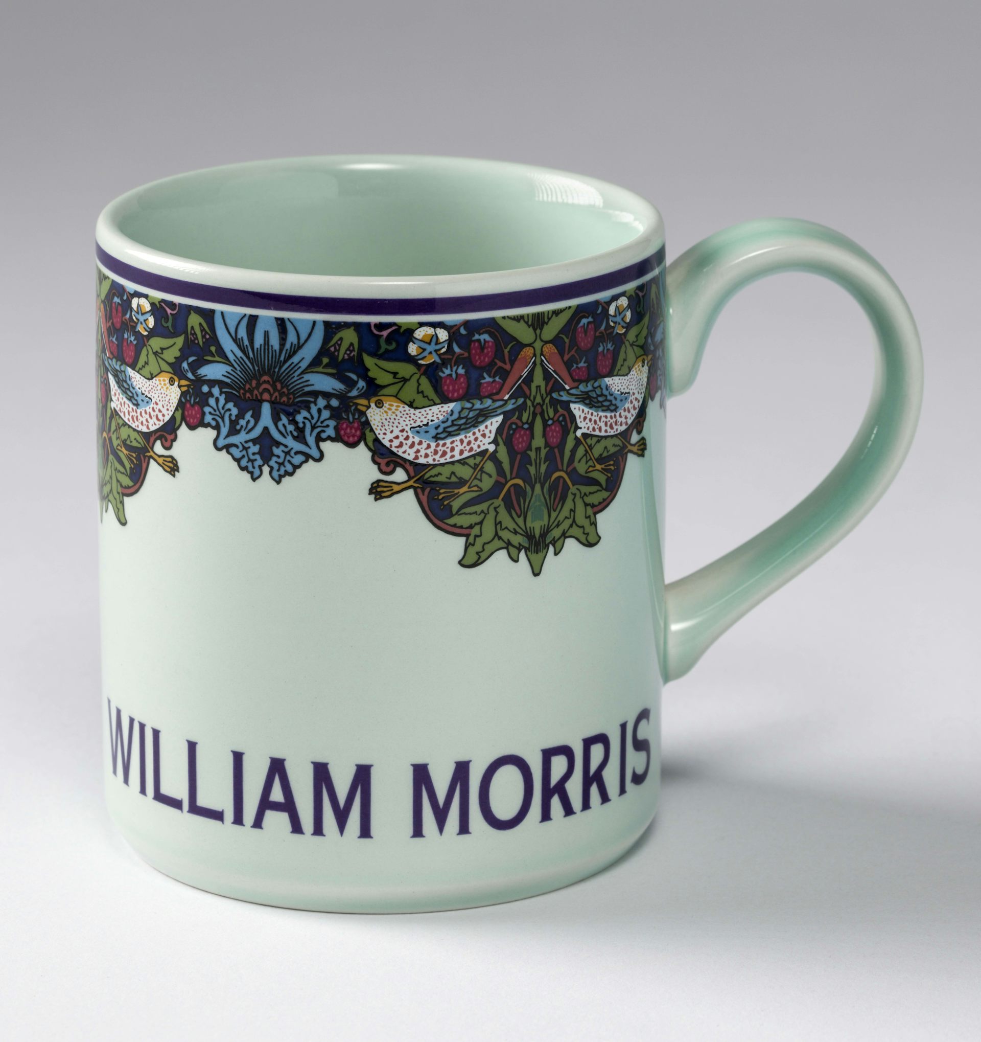 A mug that says William Morris.