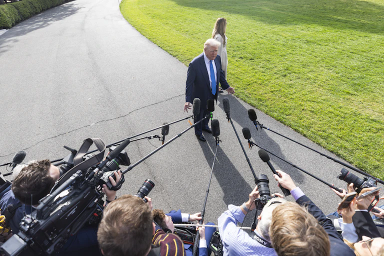 donald trump speaks to press pack outside the white house