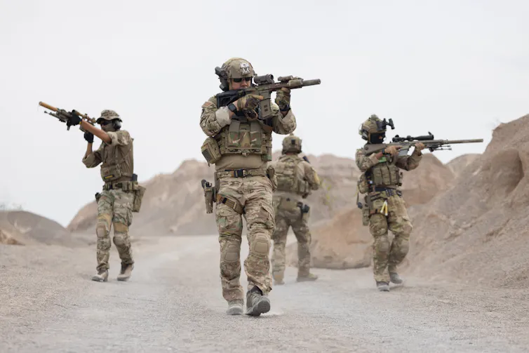 Soldiers in on patrol in the desert
