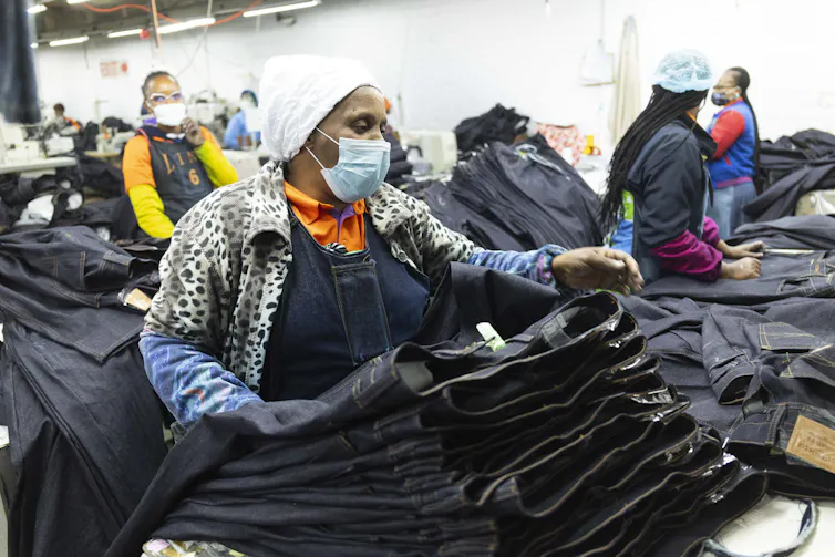 Workers producing jeans at a garment factory in Lesotho.