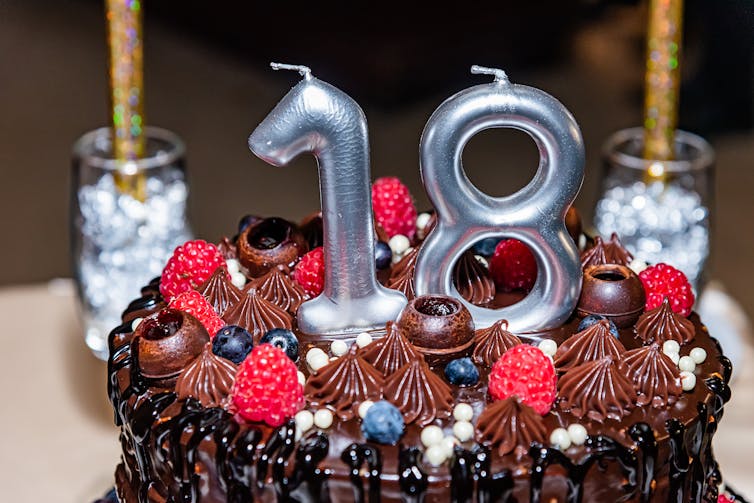 18th Birthday cake with fruit and chocolate.
