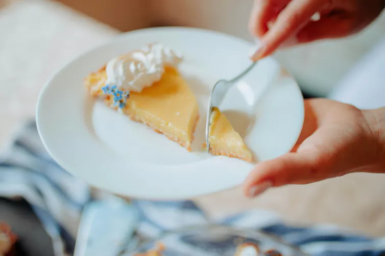 lemon slice on plate with fork