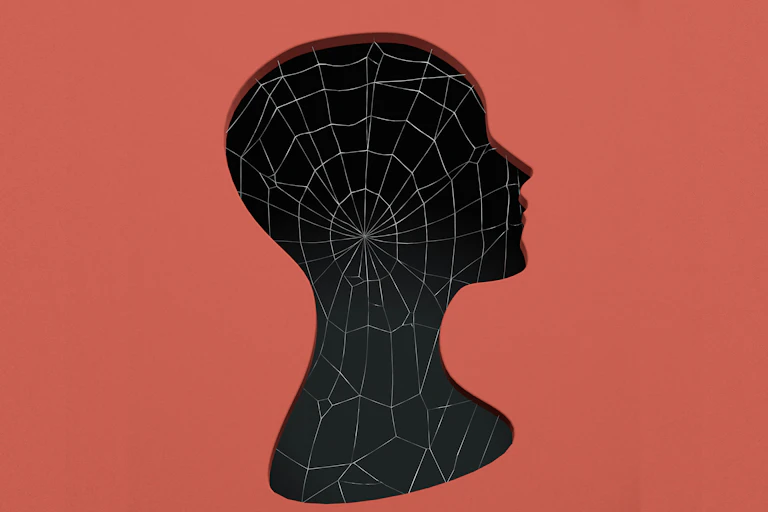 Illustration showing a black silhouette of a head in profile against a red background.