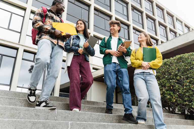 Group of students walking down steps