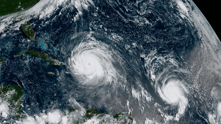 Two hurricanes seen from a satellite.