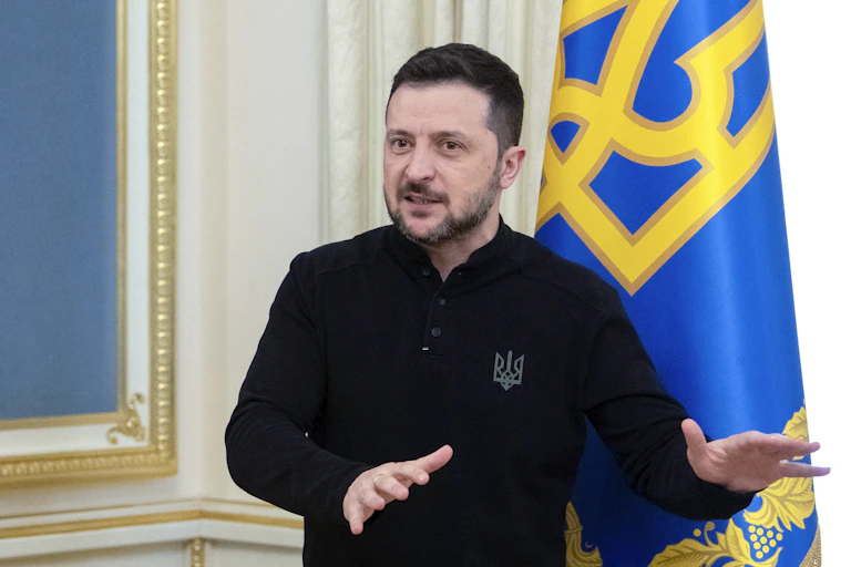 Volodymyr Zelensky attends a news conference in Kyiv.