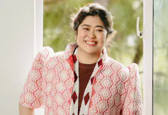 A photo of a young smiling Asian woman