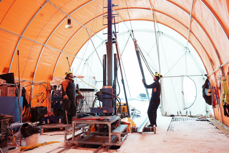 inside a camp at Antarctic where researchers drill down through into the ice