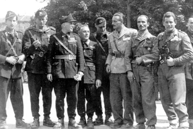 A black and white photo of Italian resistance fighters in uniform.