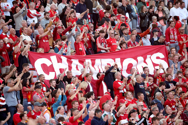 Liverpool fans celebrate their title victory.