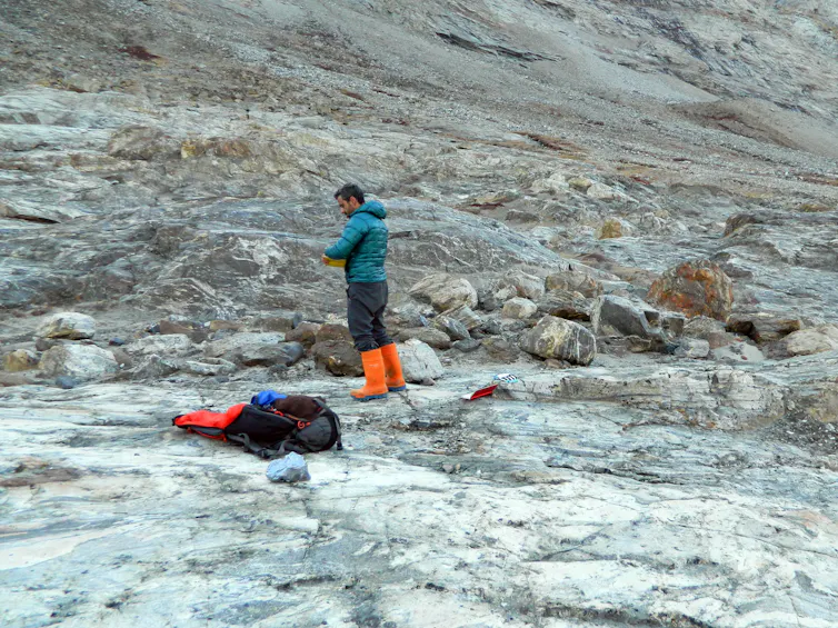 Reseachers working in a rocky area in Greenland