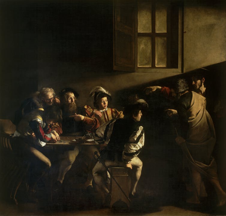 A painting shows four men seated at a table and another entering while pointing a raised finger at one of them.