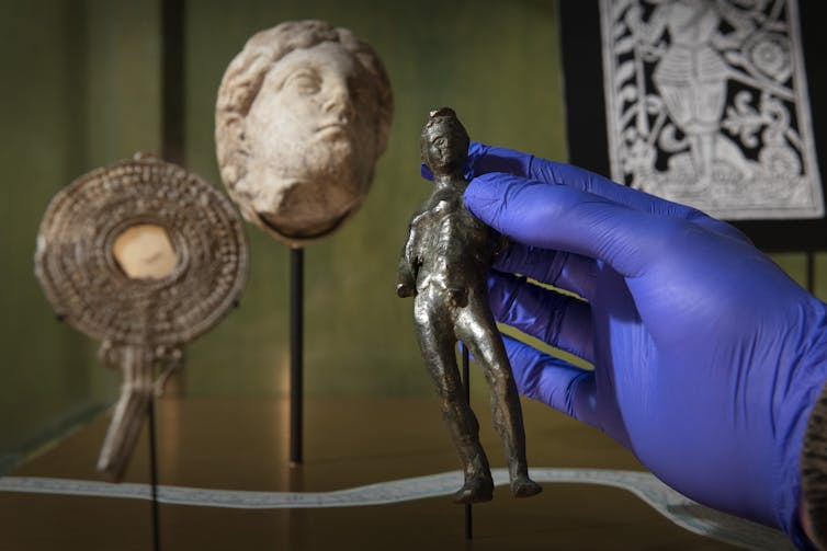 Secrets and techniques of the Thames: mudlarking treasures show off historical past of London’s river and the individuals who scour its banks 2 Statues on display in the exhibition