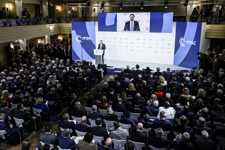 Europe is transferring to reposition itself in Donald Trump’s new world order 2 US vice-president J.D. Vance delivers a speech to a room of delegates.