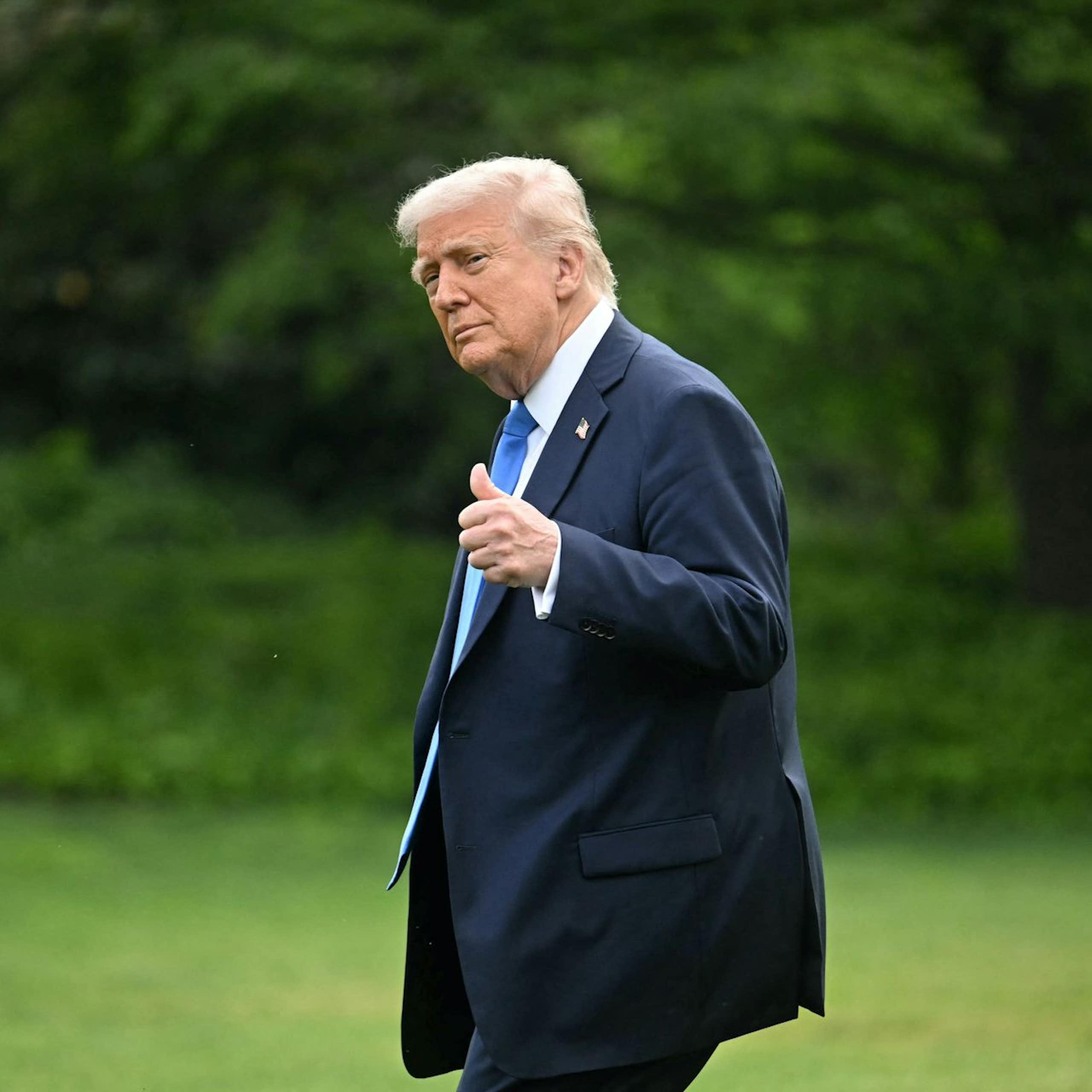 US President Donald Trump walks on the South Lawn of the White House on May 1, 2025.