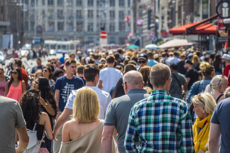 crowds of people on an Amsterdam street