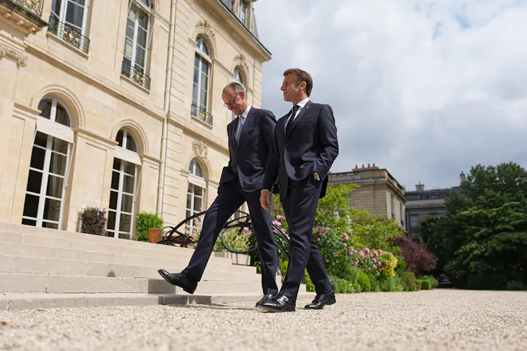 Friedrich Merz and Emmanuel Macron.
