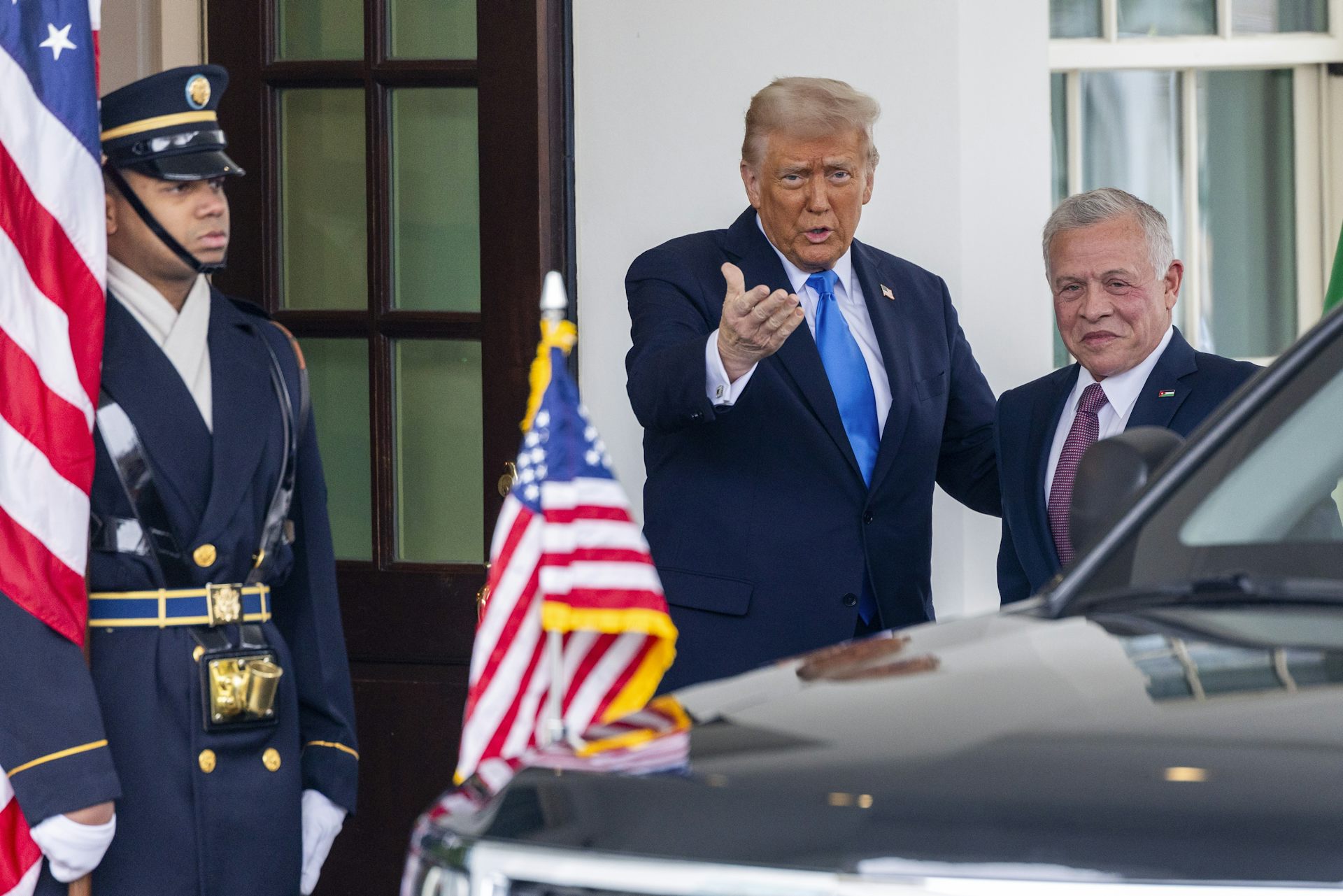 Trump greets Jordan's King Abdullah II as he arrives at the White House.