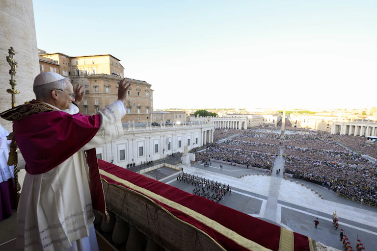 Pope Leo XIV waves to the crowd gathered in St. Peter's Square