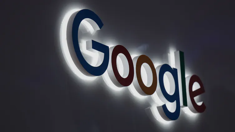 Close up photo of Google logo sign.