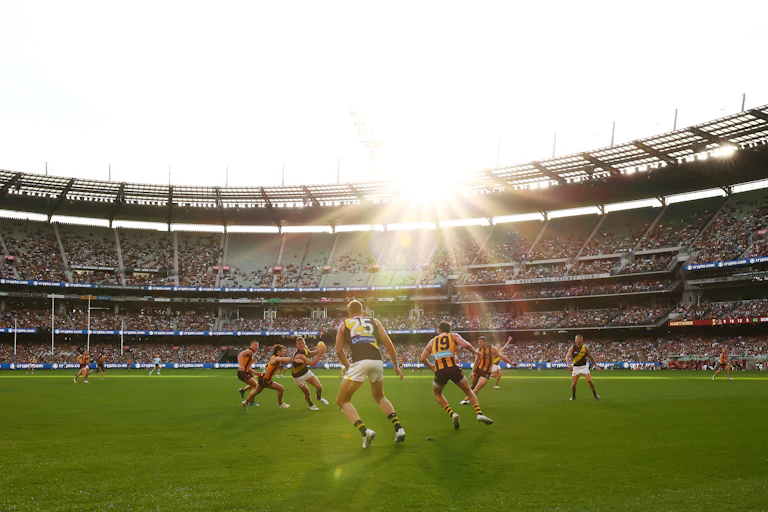 A hot sun shines down on the AFL Round 8 match between the Hawthorn Hawks and the Richmond Tigers at Melbourne Cricket Ground in Melbourne, Sunday, May 4, 2025.