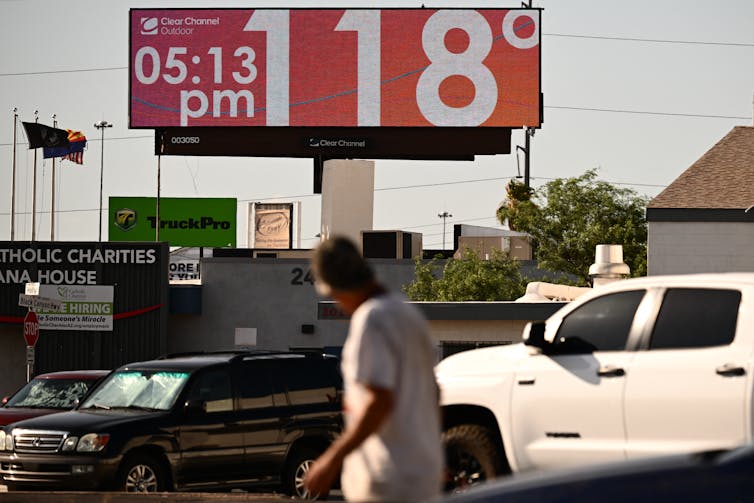 A billboard in Phoenix reads 118 degrees at 5:13 p.m. on July 19, 2023.
