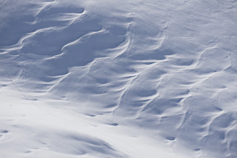 A photo of deep snow drifts.