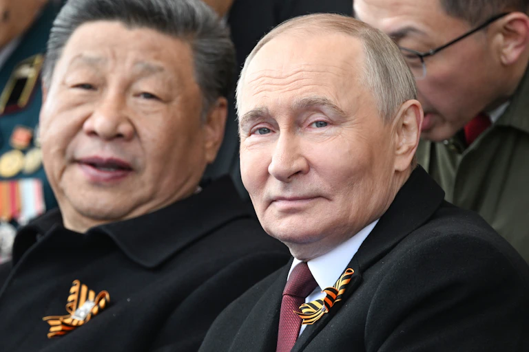 Putin and Xi attending the Victory Day military parade in Red Square, Moscow.