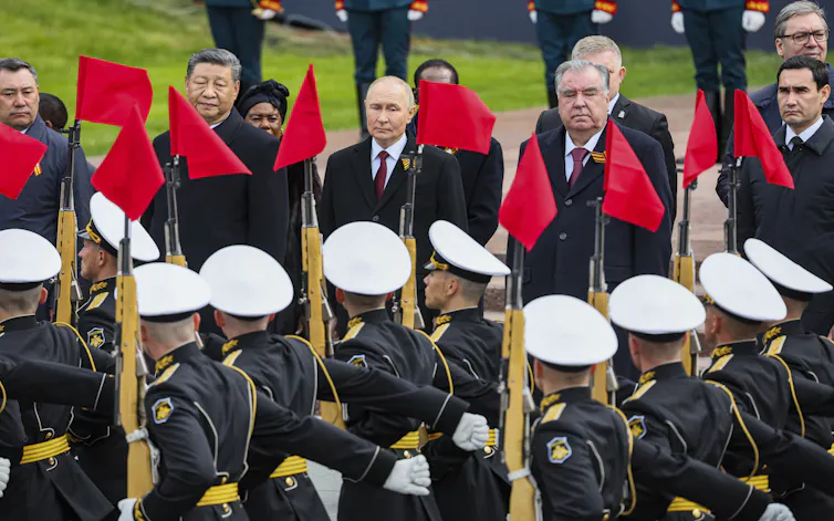 Xi and Putin stood beside each other watching the Victory Day parade in Moscow.