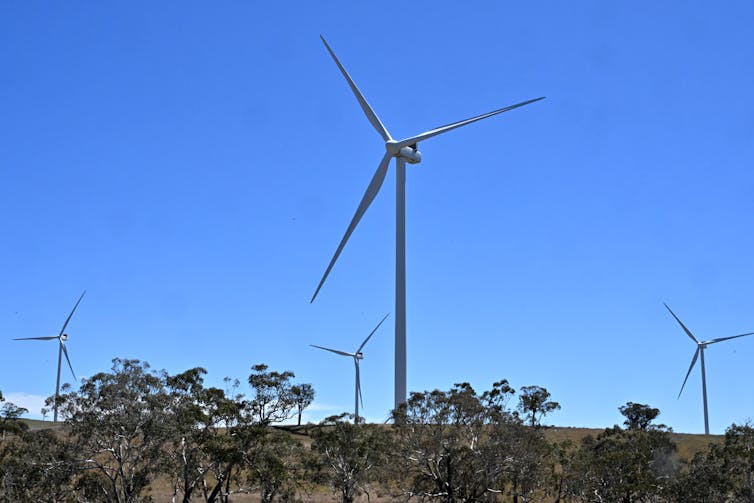 Power-generating wind turbines rise above a rural landscape at Collector Wind Farm, 50km south of Goulburn, Monday, February 17, 2025.