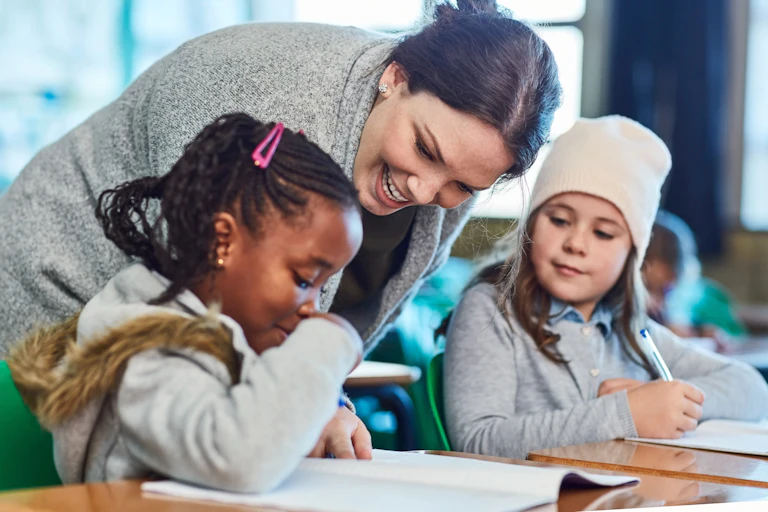 Teacher with two small children