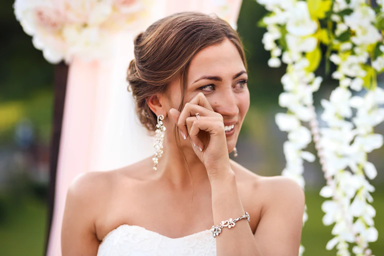 Bride crying happy tears.