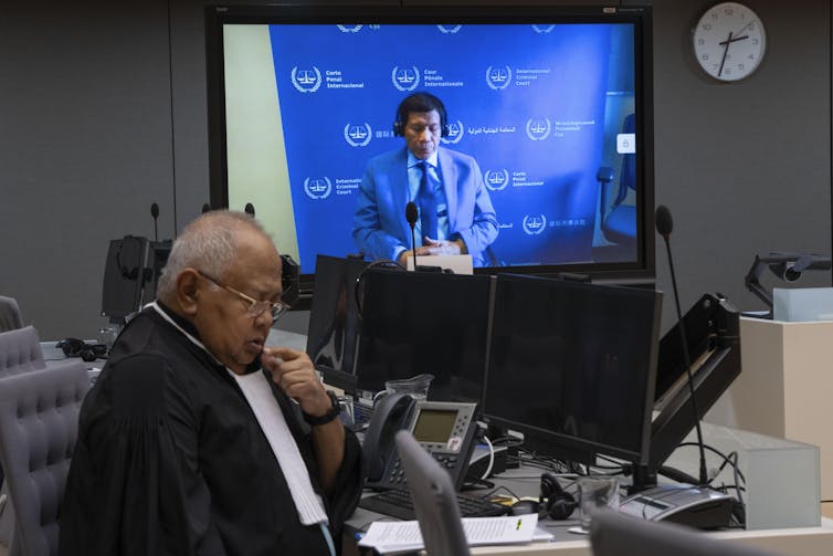 Duterte attends a court hearing virtually alongside his lawyer.