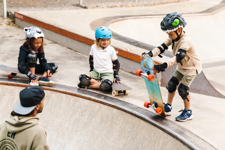 Young skaters and coach