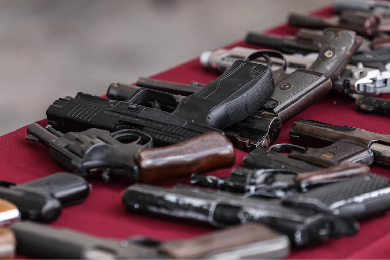 Guns on a table in Mexico.