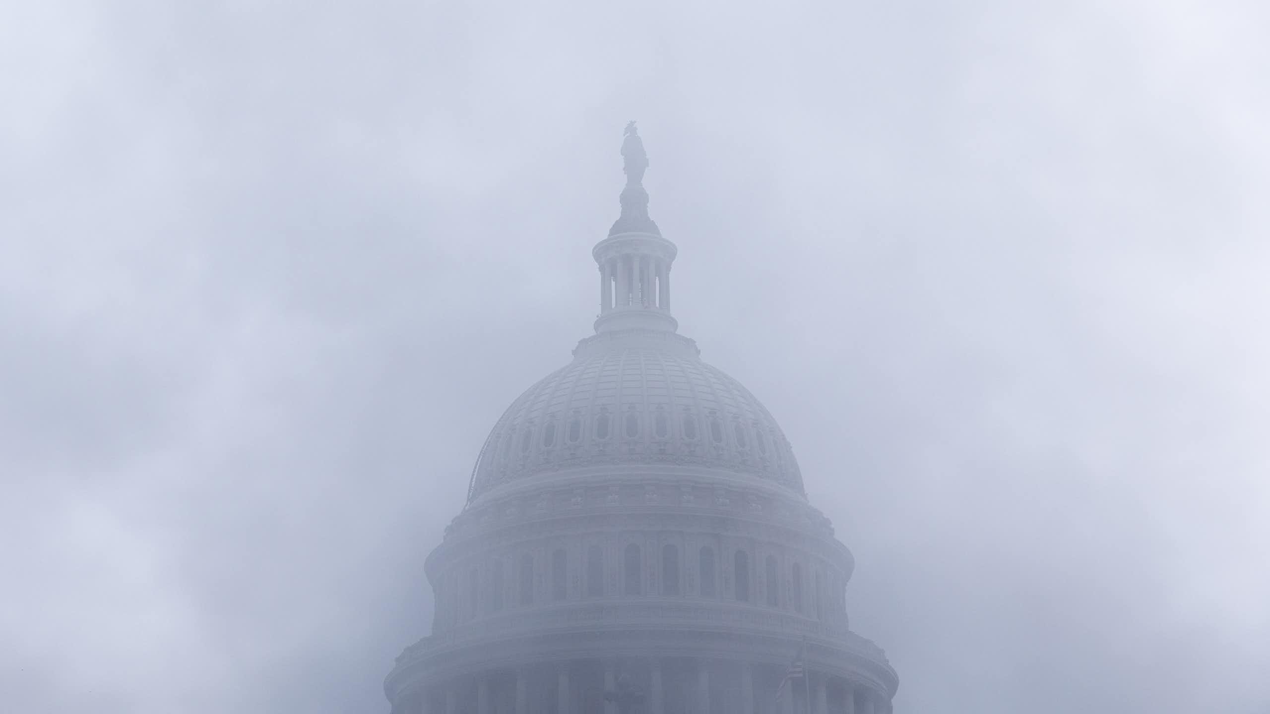 A white dome obscured by mist.