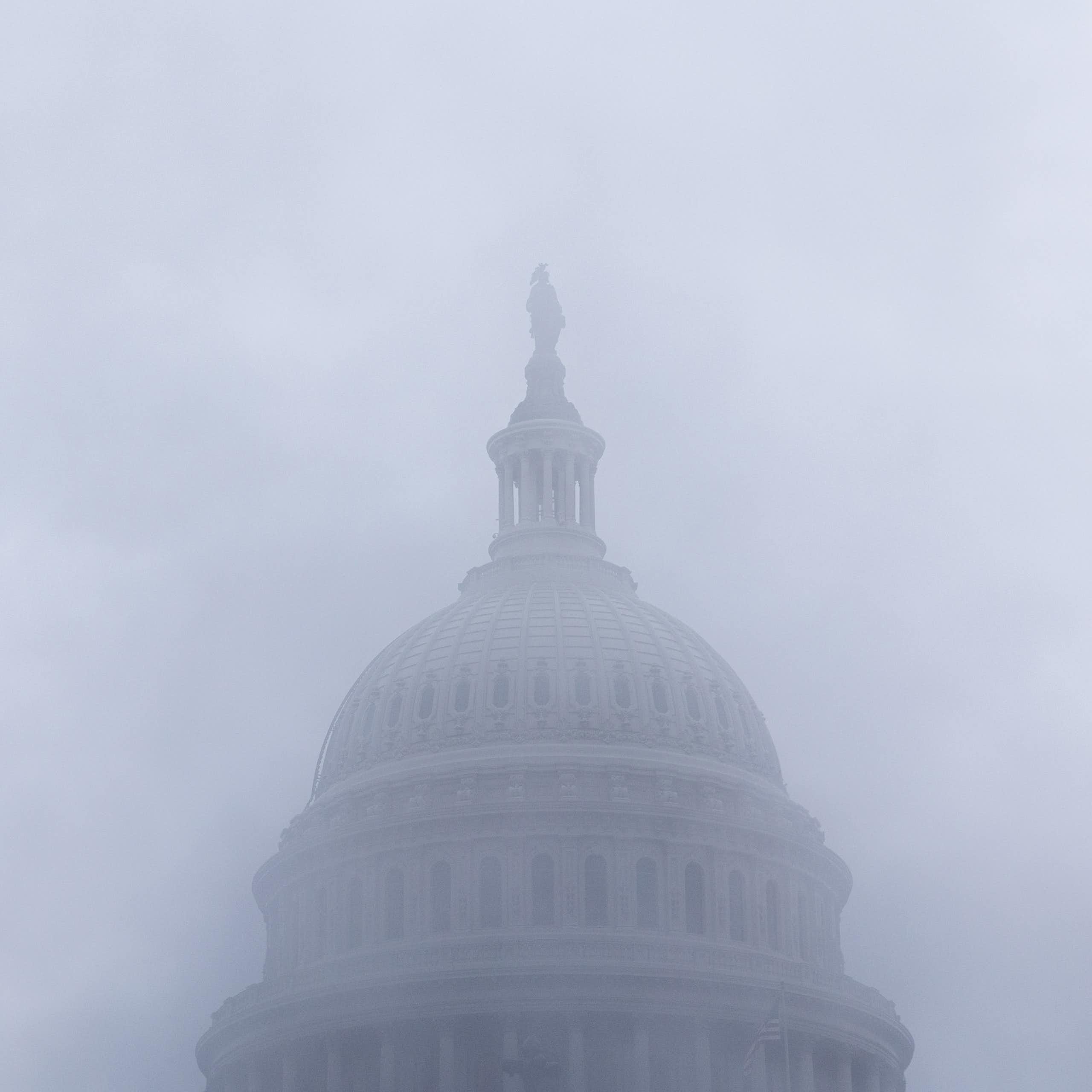 A white dome obscured by mist.