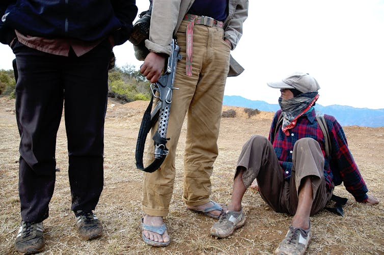 ‘Killing is part of their life’: the lads raised on violence who're each perpetrators and sufferers as South Sudan faces go back to civil struggle 5 Three members of the People's Liberation Army in Nepal, one carrying a rifle.