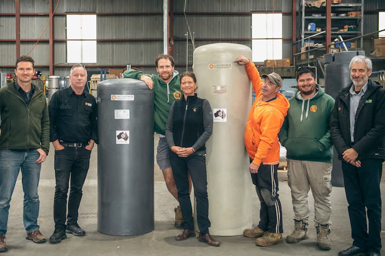 workers making solar hot water tanks