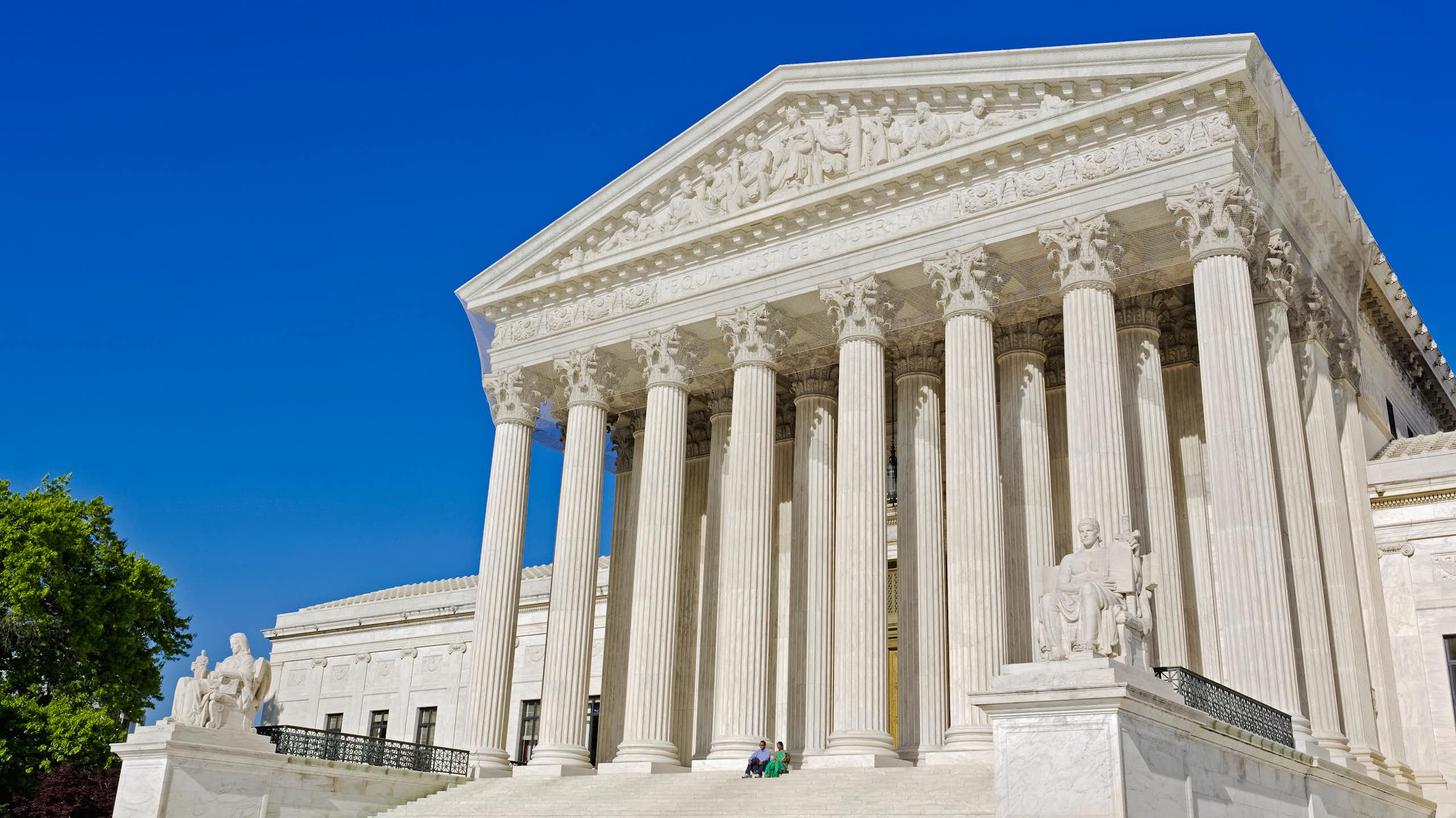 A large white, columned building.