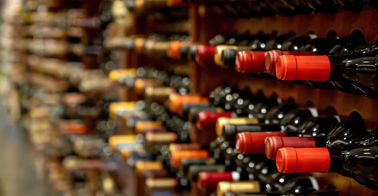 wine bottles on a rack