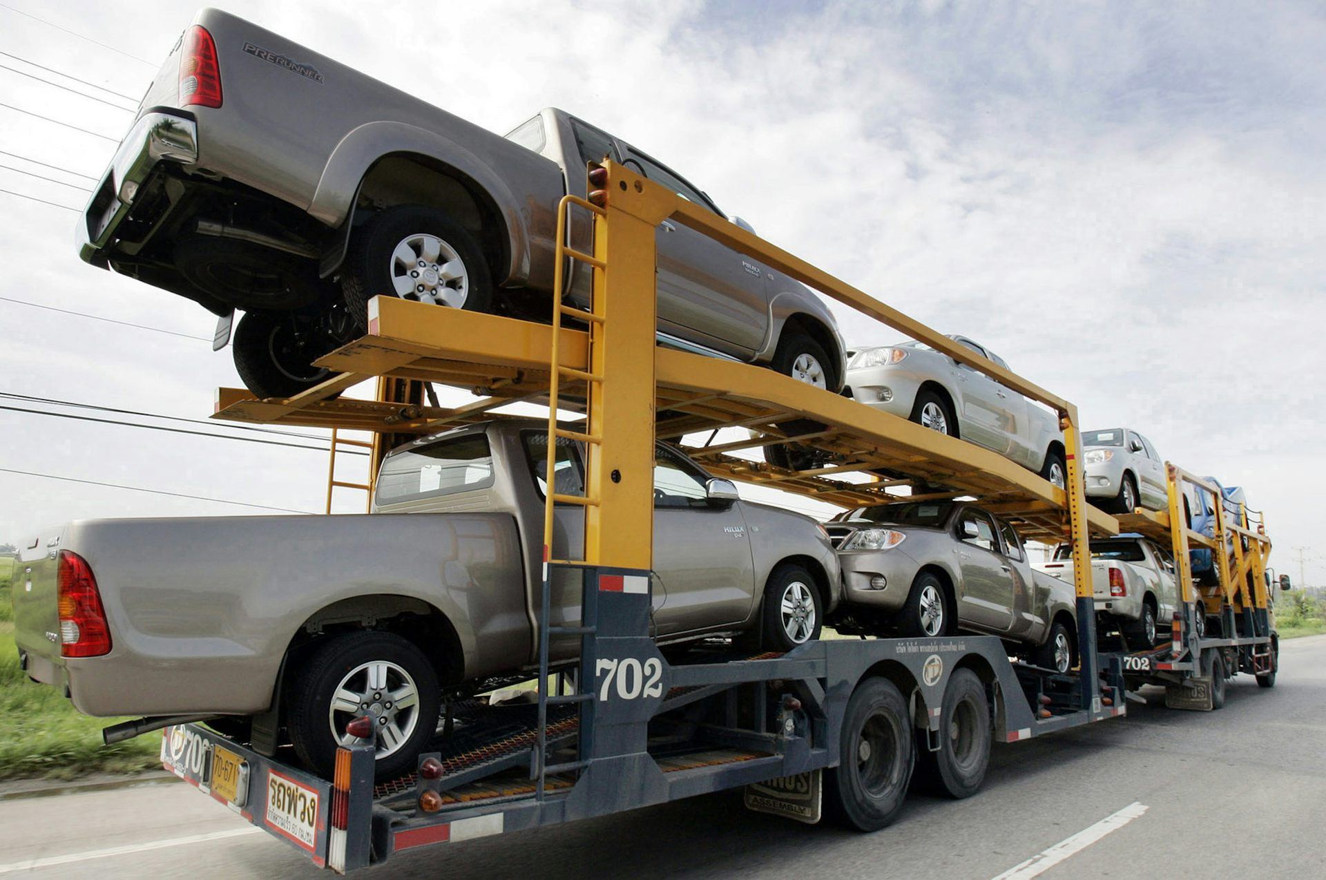 Grey pickup utes on a truck.