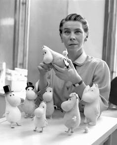 Tove Marika Jansson with Moomintroll dolls in 1956