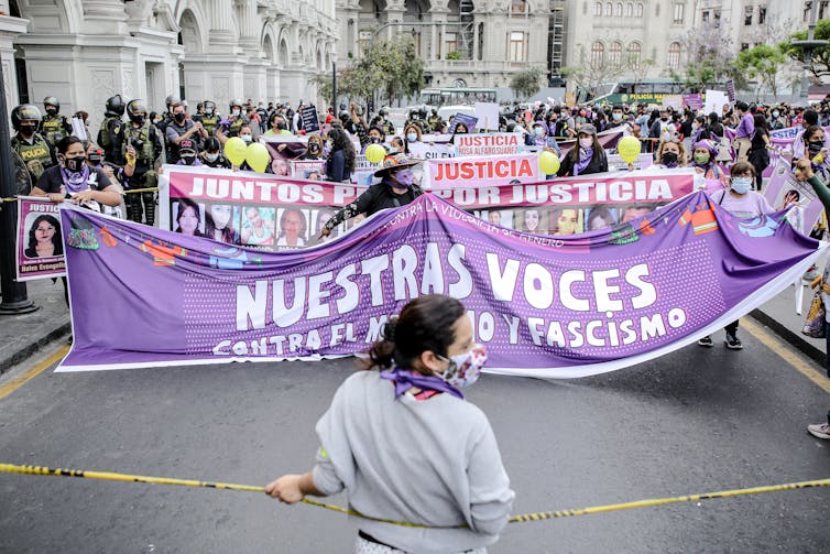 TikTok influencer’s killing on digicam highlights the femicide disaster in Latin The united states 2 People participating in a march against gender-based violence in Lima.