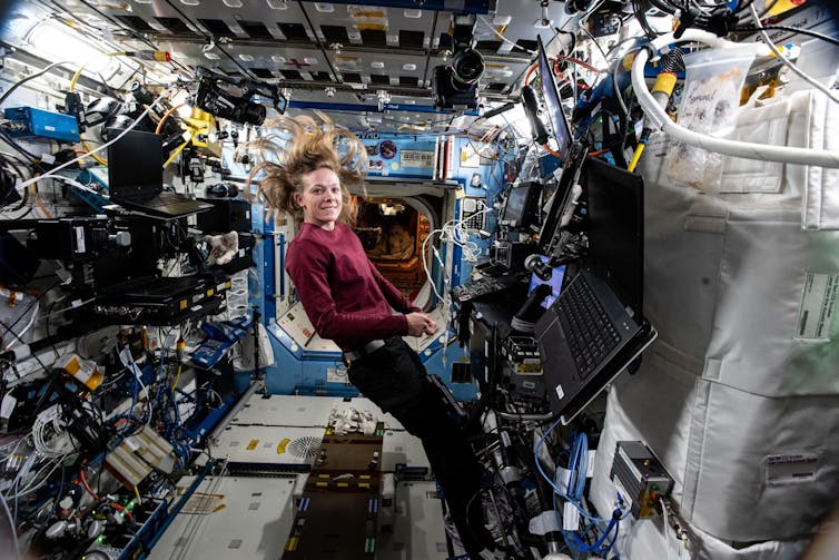 Do photons wear out? An astrophysicist explains light’s ability to travel vast cosmic distances without losing energy :: InvestMacro 1 An astronaut floats weightless aboard the International Space Station.