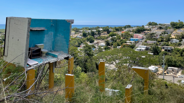 Remnants of a home destroyed by Hurricane Maria. Only the bathroom is still recognizable.