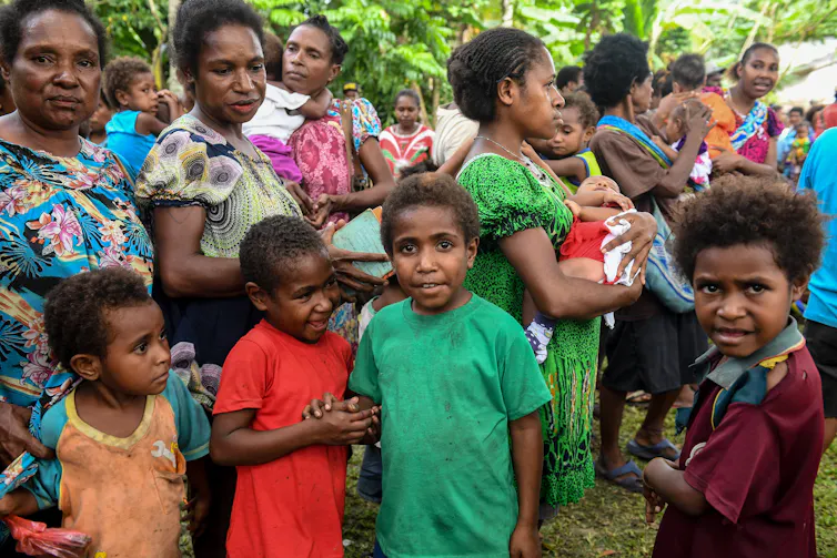 Children and adults in Lae, PNG.